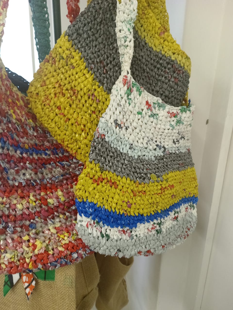 Colorful handmade bags made through practical craft work
